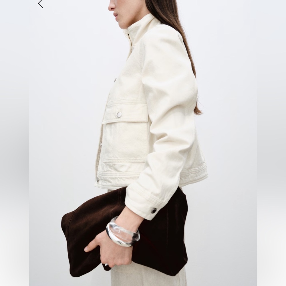 Cotton jacket with high collar and pockets